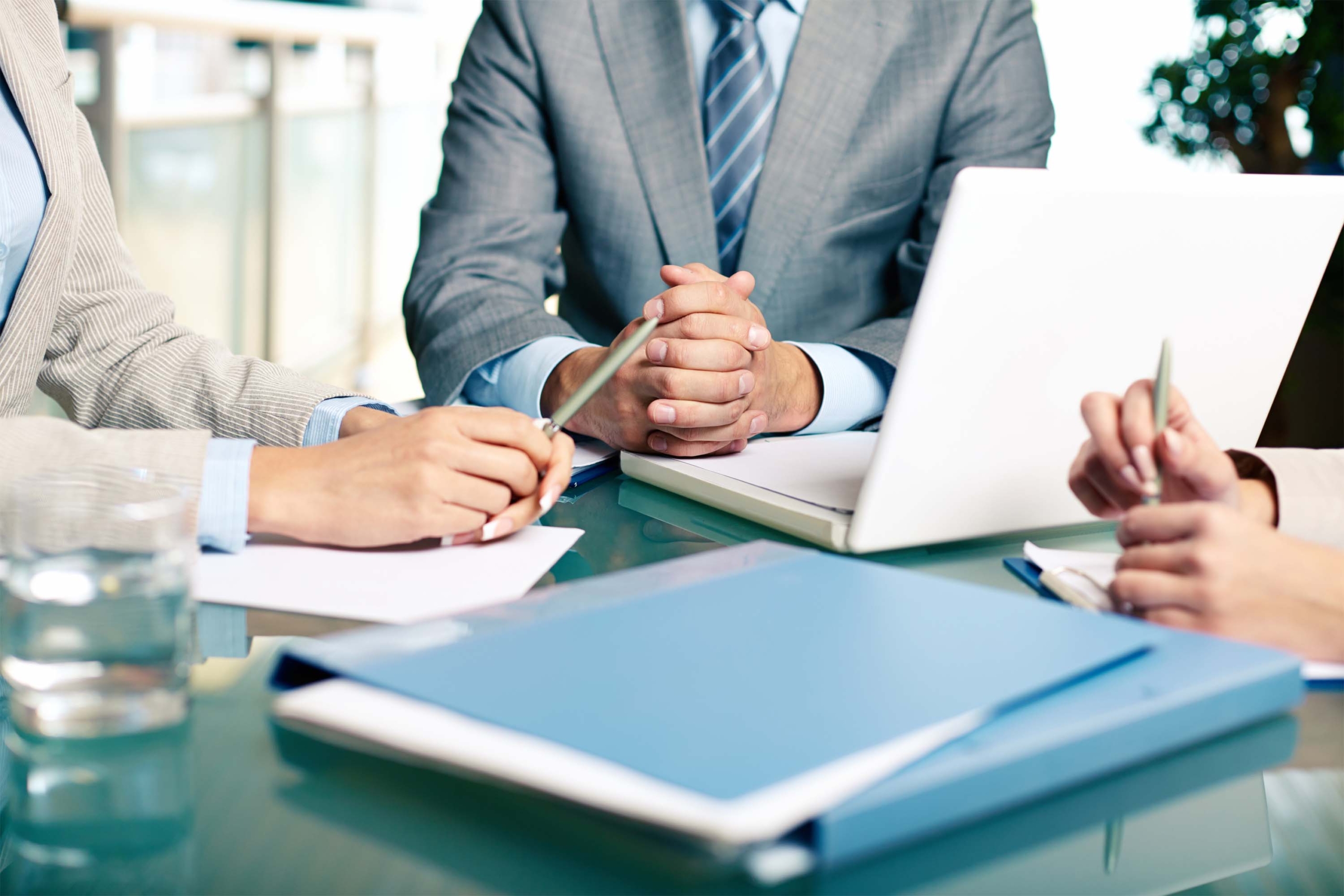 close-up-executives-sitting-tablee