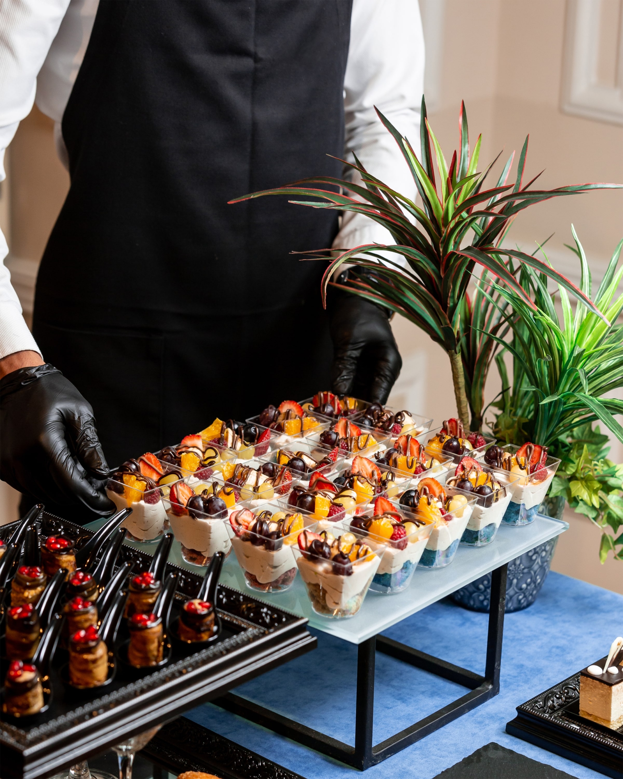 cup-dessert-with-whipped-cream-strawberries-cherries-orangue-min